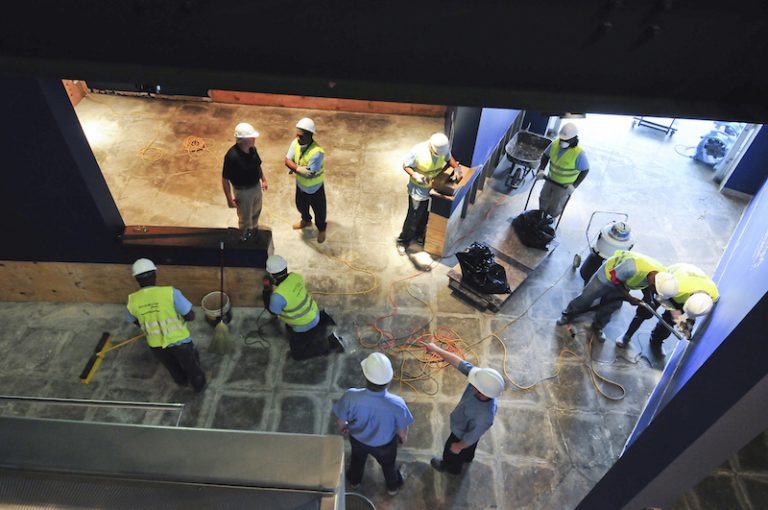 Workers doing post-construction cleanup in a Portland construction project